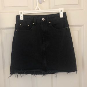 Black denim mini skirt